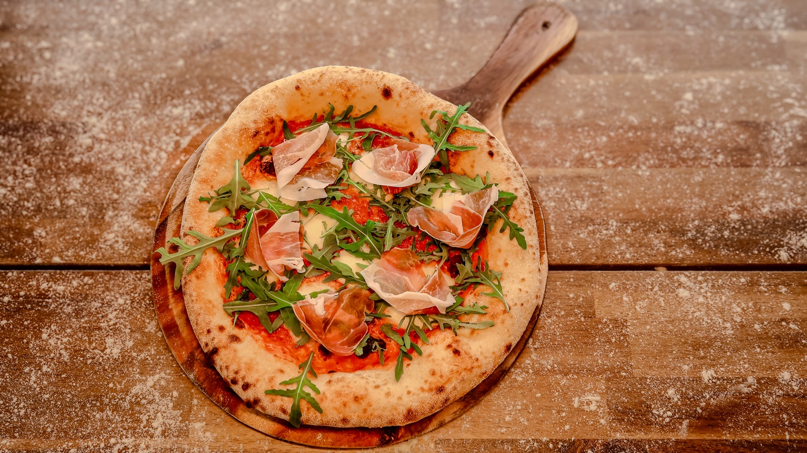 Crudo e rucola
